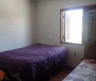 Casa com 174m², 3 dormitórios, 1 suíte, 1 vaga no bairro Jardim Itu Sabará em Porto Alegre