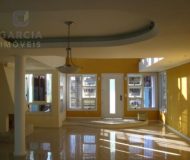 Casa com 319m², 3 dormitórios, 2 suítes, 3 vagas no bairro Santa Fé em Porto Alegre