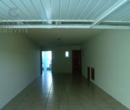 Casa com 319m², 3 dormitórios, 2 suítes, 3 vagas no bairro Santa Fé em Porto Alegre