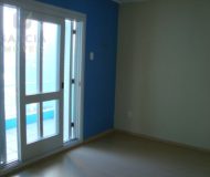 Casa com 319m², 3 dormitórios, 2 suítes, 3 vagas no bairro Santa Fé em Porto Alegre