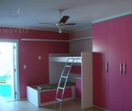 Casa com 319m², 3 dormitórios, 2 suítes, 3 vagas no bairro Santa Fé em Porto Alegre