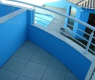 Casa com 319m², 3 dormitórios, 2 suítes, 3 vagas no bairro Santa Fé em Porto Alegre