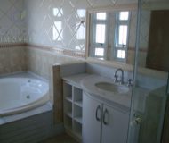 Casa com 319m², 3 dormitórios, 2 suítes, 3 vagas no bairro Santa Fé em Porto Alegre