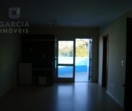 Casa com 319m², 3 dormitórios, 2 suítes, 3 vagas no bairro Santa Fé em Porto Alegre