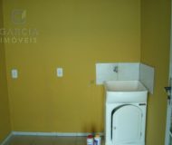 Casa com 319m², 3 dormitórios, 2 suítes, 3 vagas no bairro Santa Fé em Porto Alegre