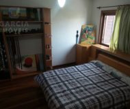 Casa com 174m², 3 dormitórios, 1 suíte, 1 vaga no bairro Jardim Itu Sabará em Porto Alegre