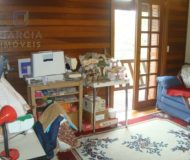 Casa com 172m², 3 dormitórios, 1 suíte, 3 vagas no bairro Jardim Itu Sabará em Porto Alegre