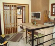 Casa com 390m², 4 dormitórios, 4 suítes, 6 vagas no bairro Jardim Planalto em Porto Alegre