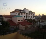 Casa com 390m², 4 dormitórios, 4 suítes, 6 vagas no bairro Jardim Planalto em Porto Alegre