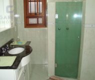 Casa com 390m², 4 dormitórios, 4 suítes, 6 vagas no bairro Jardim Planalto em Porto Alegre