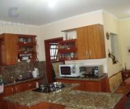 Casa com 390m², 4 dormitórios, 4 suítes, 6 vagas no bairro Jardim Planalto em Porto Alegre