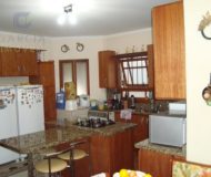 Casa com 390m², 4 dormitórios, 4 suítes, 6 vagas no bairro Jardim Planalto em Porto Alegre