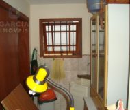 Casa com 390m², 4 dormitórios, 4 suítes, 6 vagas no bairro Jardim Planalto em Porto Alegre