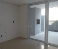 Casa com 204m², 3 dormitórios, 3 suítes, 2 vagas no bairro Jardim Itu Sabará em Porto Alegre