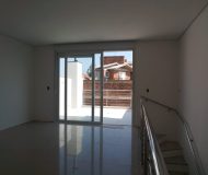 Casa com 204m², 3 dormitórios, 3 suítes, 2 vagas no bairro Jardim Itu Sabará em Porto Alegre