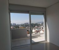 Casa com 204m², 3 dormitórios, 3 suítes, 2 vagas no bairro Jardim Itu Sabará em Porto Alegre