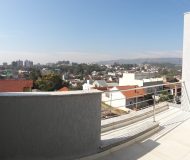 Casa com 204m², 3 dormitórios, 3 suítes, 2 vagas no bairro Jardim Itu Sabará em Porto Alegre