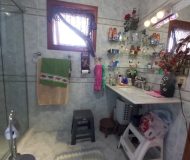 Casa com 212m², 3 dormitórios, 1 suíte, 2 vagas no bairro Vila Floresta em Porto Alegre