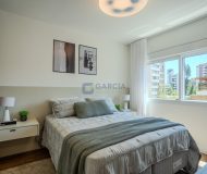 Apartamento com 112m², 3 dormitórios, 3 suítes, 2 vagas no bairro Auxiliadora em Porto Alegre