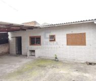 Casa com 150m², 3 dormitórios, 3 vagas no bairro Parque dos Maias em Porto Alegre