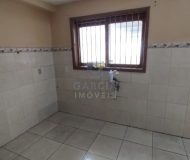 Casa com 150m², 3 dormitórios, 3 vagas no bairro Parque dos Maias em Porto Alegre