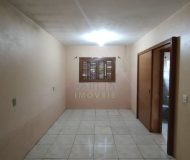 Casa com 150m², 3 dormitórios, 3 vagas no bairro Parque dos Maias em Porto Alegre