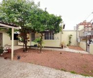 Casa com 153m², 3 dormitórios, 1 suíte, 2 vagas no bairro Sarandi em Porto Alegre