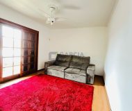 Casa com 313m², 4 dormitórios, 1 suíte, 5 vagas no bairro Passo das Pedras em Porto Alegre