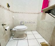 Casa com 313m², 4 dormitórios, 1 suíte, 5 vagas no bairro Passo das Pedras em Porto Alegre