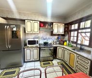 Casa com 313m², 4 dormitórios, 1 suíte, 5 vagas no bairro Passo das Pedras em Porto Alegre