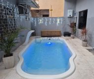 Casa com 198m², 3 dormitórios, 1 suíte, 5 vagas no bairro Sarandi em Porto Alegre