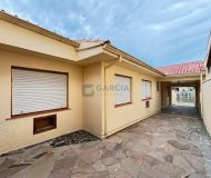 Casa com 220m², 3 dormitórios, 1 suíte, 4 vagas no bairro Jardim Lindóia em Porto Alegre