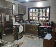 Casa com 195m², 5 dormitórios, 4 vagas no bairro Sumaré em Alvorada