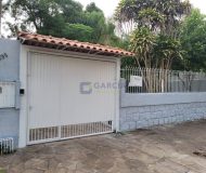 Casa com 341m², 3 dormitórios, 1 suíte, 8 vagas no bairro Ipanema em Porto Alegre