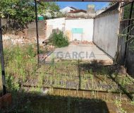 Casa com 346m², 4 dormitórios, 3 vagas no bairro Jardim Itu Sabará em Porto Alegre