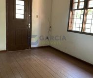 Casa com 346m², 4 dormitórios, 3 vagas no bairro Jardim Itu Sabará em Porto Alegre