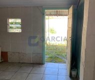 Casa com 346m², 4 dormitórios, 3 vagas no bairro Jardim Itu Sabará em Porto Alegre