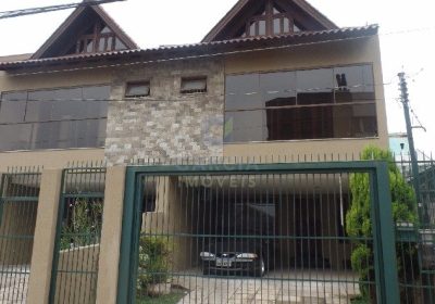 Casa com 230m², 3 dormitórios, 1 suíte, 2 vagas no bairro Jardim Barão do Cahy em Porto Alegre