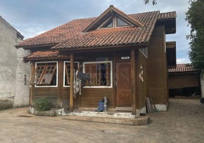 Casa com 300m², 3 dormitórios, 1 suíte, 3 vagas no bairro Jardim Itu Sabará em Porto Alegre