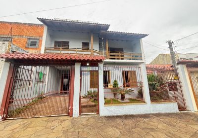 Casa com 390m², 5 dormitórios, 1 suíte, 4 vagas no bairro Sarandi em Porto Alegre
