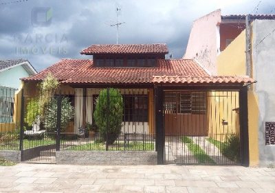 Casa com 159m², 2 dormitórios, 1 suíte, 2 vagas no bairro Parque da Matriz em Cachoeirinha