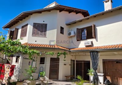 Casa com 460m², 5 dormitórios, 5 suítes, 2 vagas no bairro Sarandi em Porto Alegre