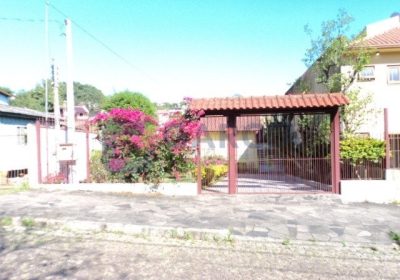 Casa com 363m², 3 dormitórios, 1 suíte, 2 vagas no bairro Partenon em Porto Alegre