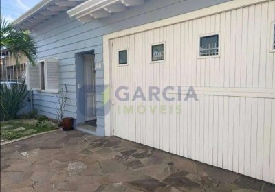 Casa com 280m², 3 dormitórios, 1 suíte, 2 vagas no bairro Sarandi em Porto Alegre