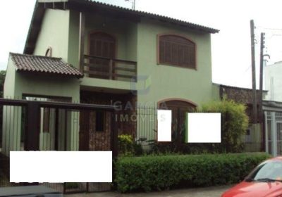 Casa com 288m², 6 dormitórios, 2 suítes, 3 vagas no bairro Sarandi em Porto Alegre