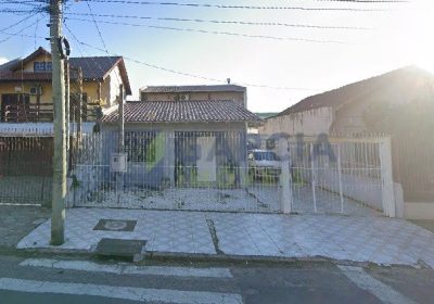 Casa com 198m², 3 dormitórios, 1 suíte, 5 vagas no bairro Parque Minuano em Porto Alegre