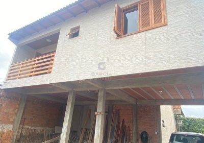 Casa com 300m², 4 dormitórios, 1 suíte, 2 vagas no bairro Sarandi em Porto Alegre