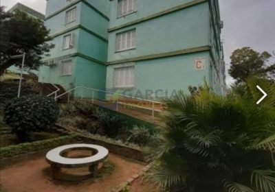 Apartamento com 56m², 2 dormitórios, 1 vaga no bairro Santa Tereza em Porto Alegre