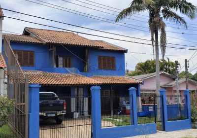Casa com 360m², 7 dormitórios, 1 suíte, 2 vagas no bairro Jardim Itu em Porto Alegre