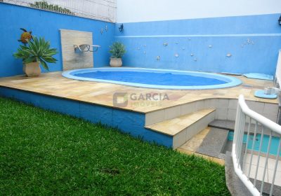 Casa com 365m², 4 dormitórios, 2 suítes, 4 vagas no bairro São Sebastião em Porto Alegre